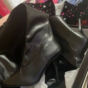 Thigh high 4inches stilettos never been worn